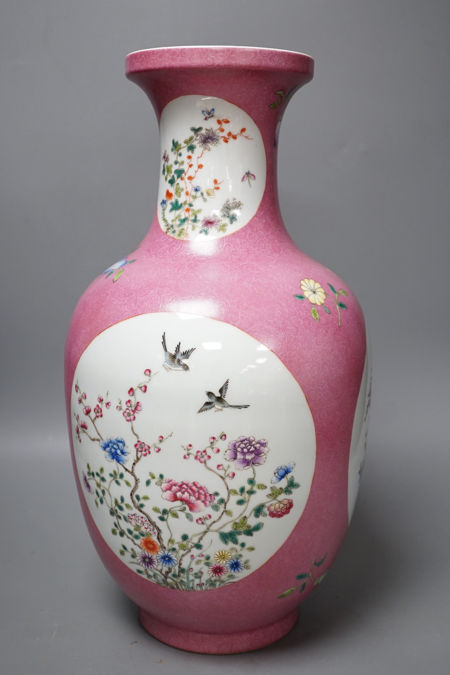 A large Chinese famille rose ruby ground vase, seal mark, 42cm